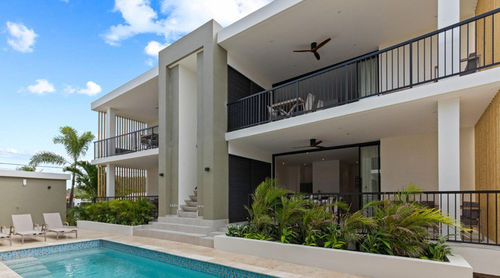 آخرین اخبار شرکت در مورد پروژه ویلاهای کارائیب: بهبود زندگی گرمسیری با فن های سقف چوبی